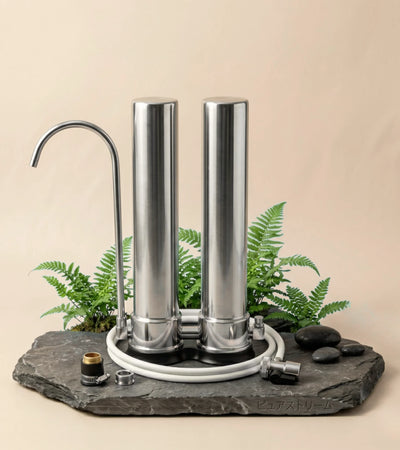 Clear Spiral Water Filtration System on Stone Slate